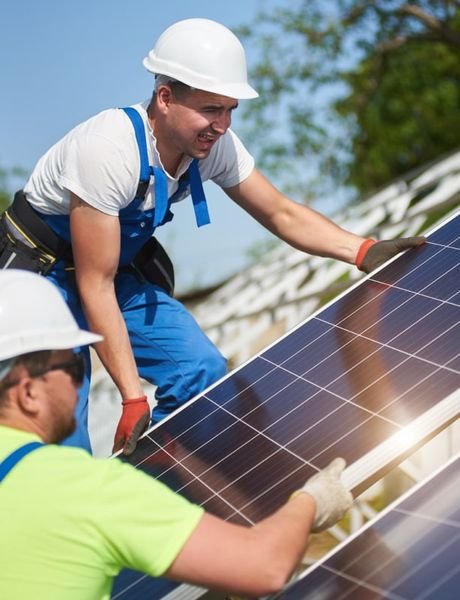 Installers mounting solar panels